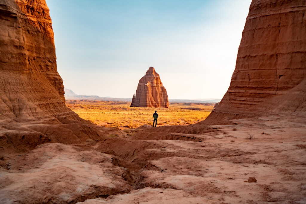 hiker in cathedral valley